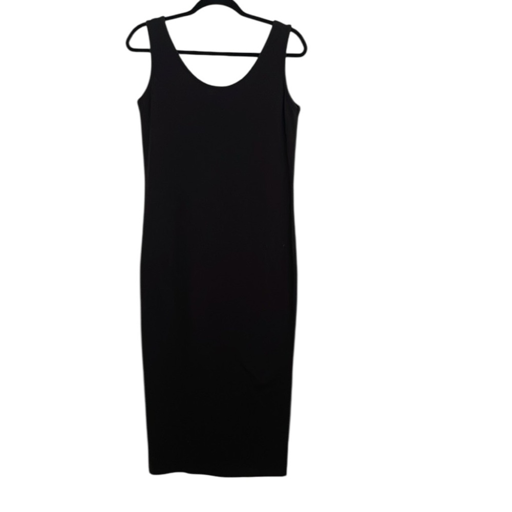Vintage 70’s Express Tricot black midi shift dress
made in Hong Kong